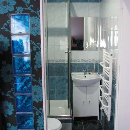 Δωμάτια σε οικογενειακή κατοικία Goscinne Gallick *